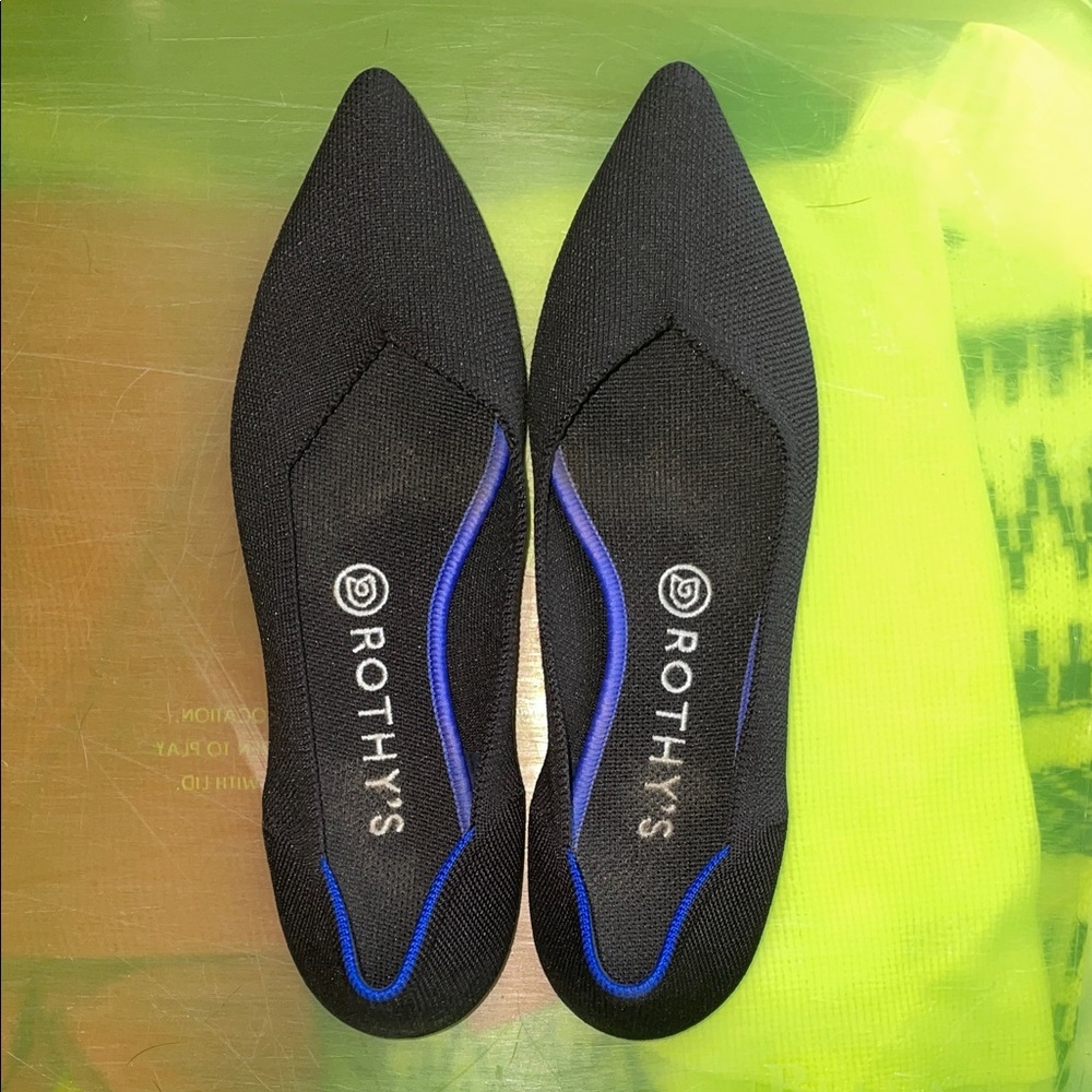 Rothy's Pointed Black Flats with Blue Trim